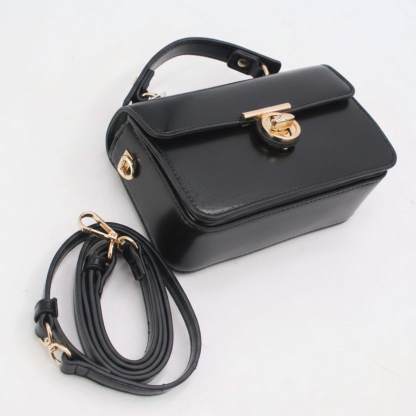 Sac à main avec une bandoulière amovible et une fermeture dorée - Noir - taille 41 - vue 1